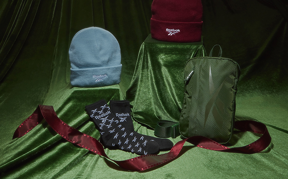 https://reebok.bynder.com/m/62141f66157e35eb/webimage-23SS_Holiday_Gifts-Under-25_IWP-Tile_MB.png