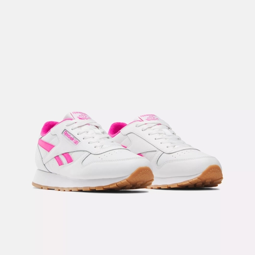 Reebok pink sale and white trainers