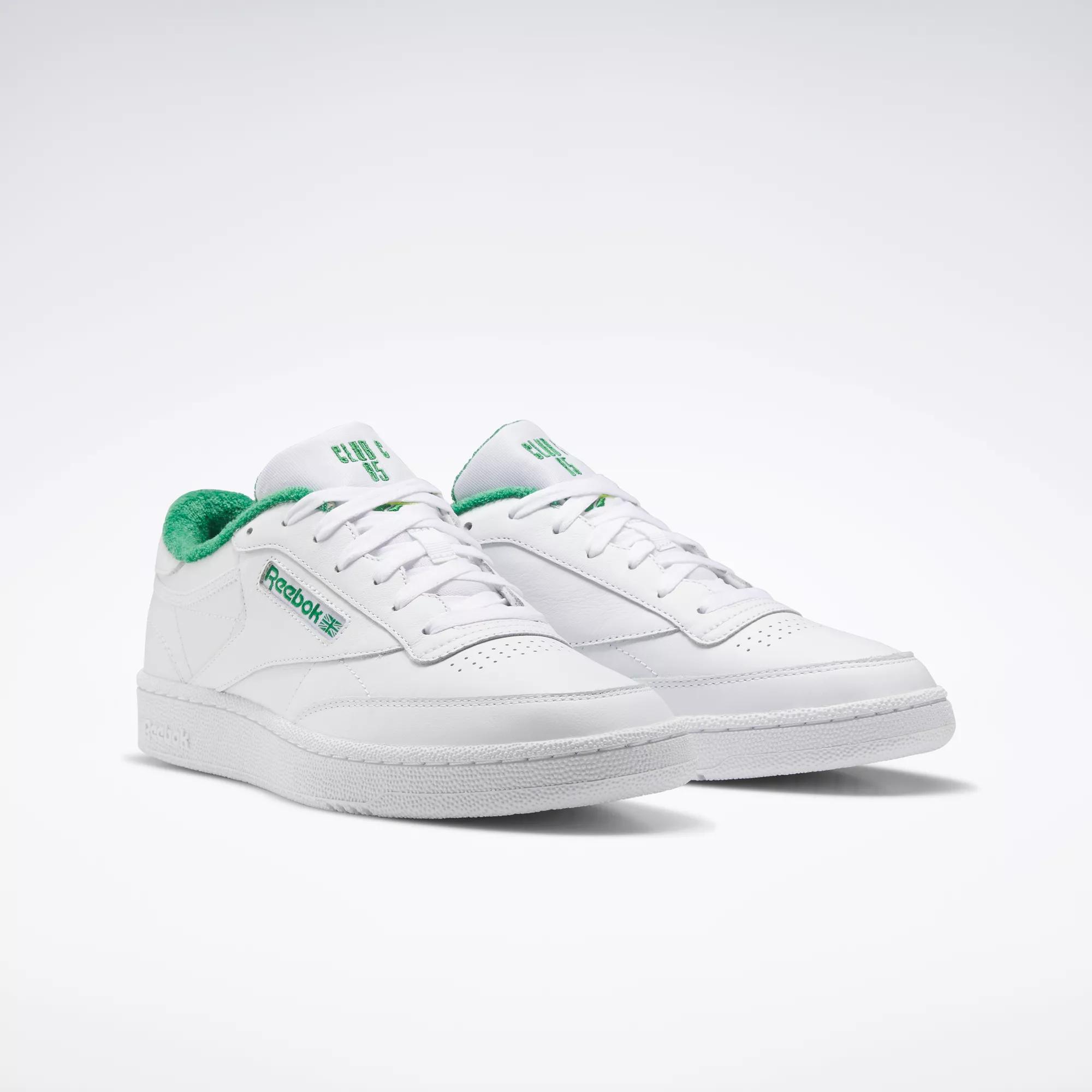 Reebok white store with green