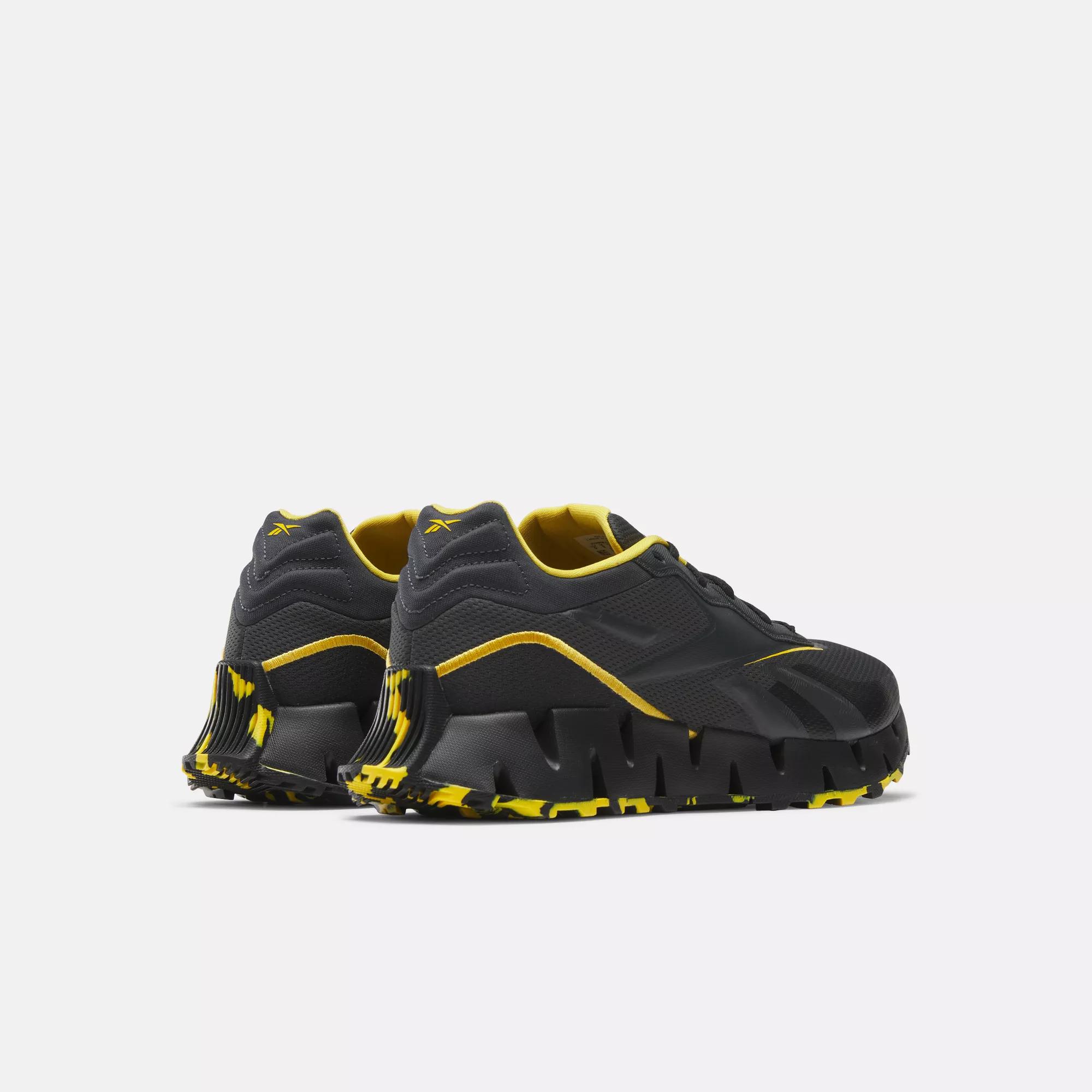 Black and yellow outlet reebok