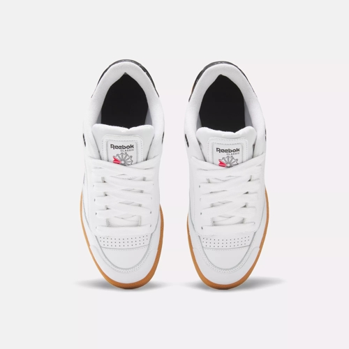 White reebok with hot sale bubble gum bottom