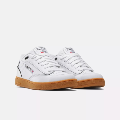 White reebok outlet gum bottom