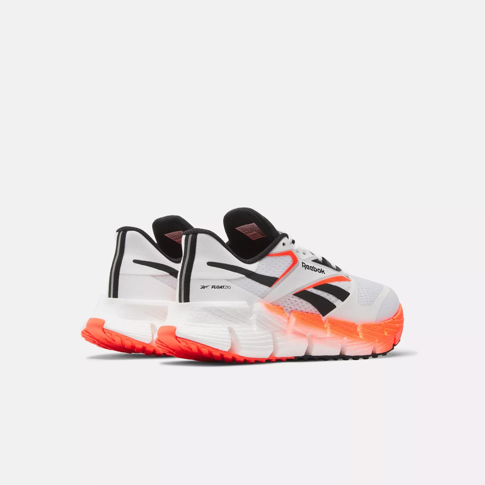 Reebok black orange shoes online