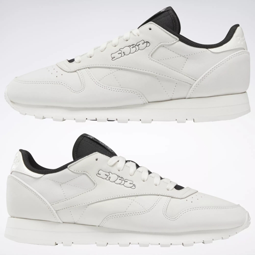 Reebok black cheap and white trainers