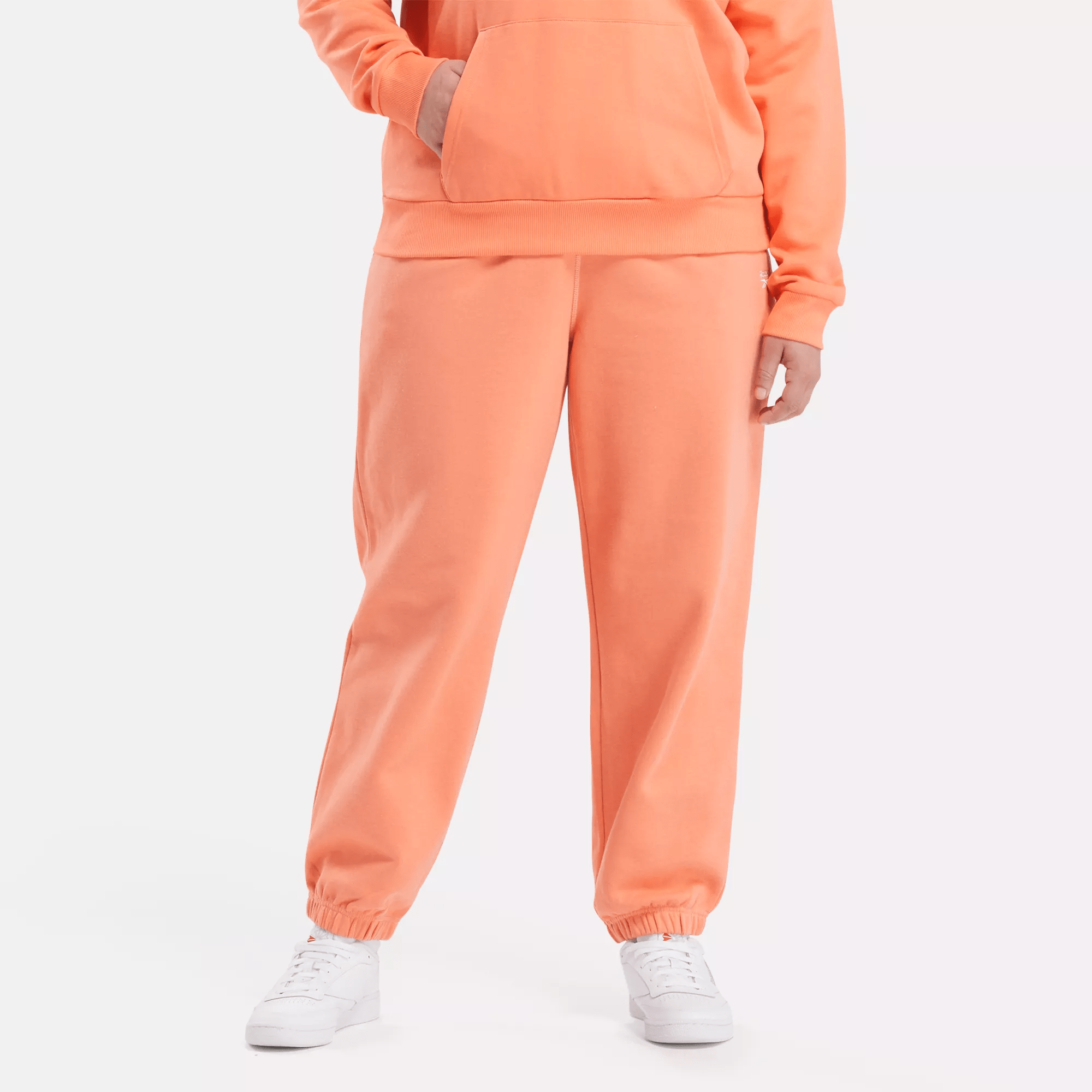 Shop Reebok Women's  Identity Small Logo Fleece Joggers (plus Size) In Supercharged Coral