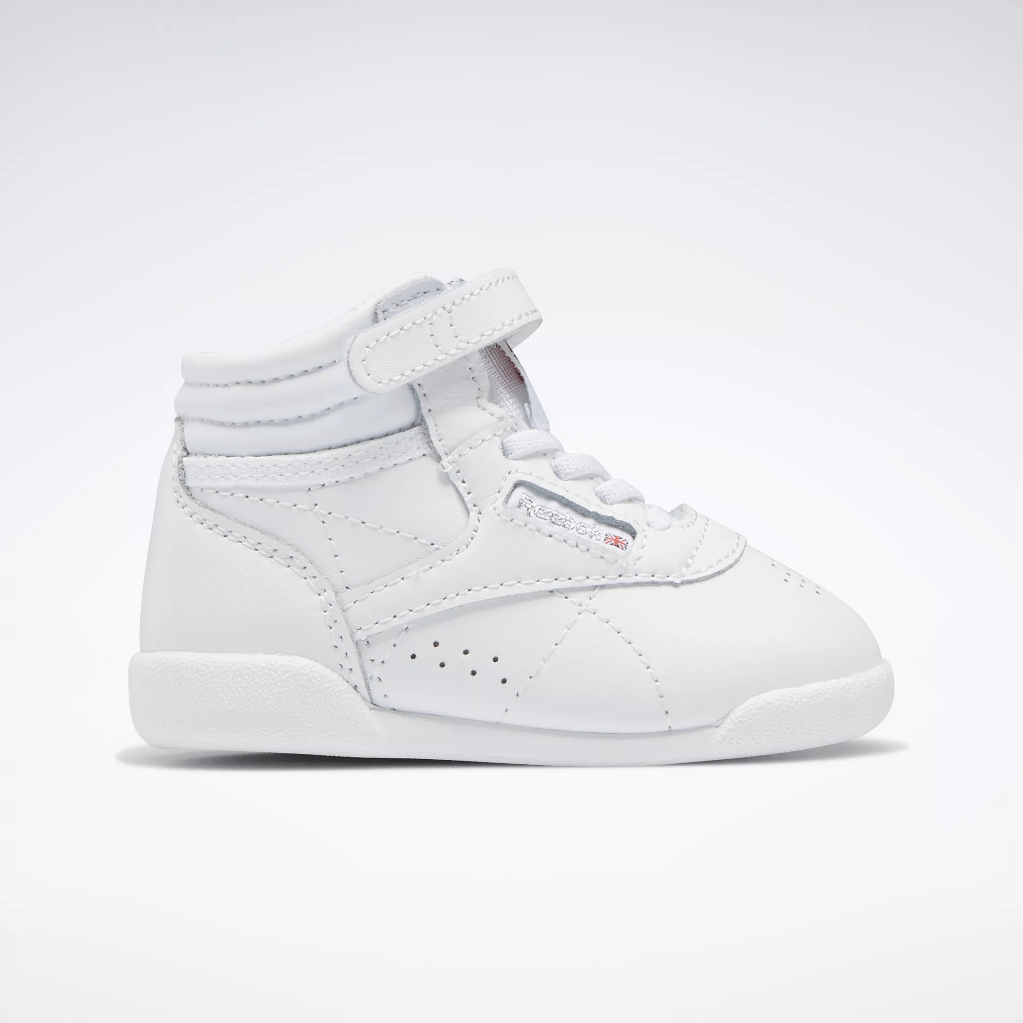 Shop Reebok Unisex Freestyle Hi Shoes - Toddler In White