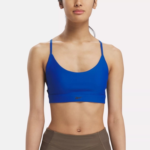 Reebok Kerys logo crop top sports bra in blue and cream