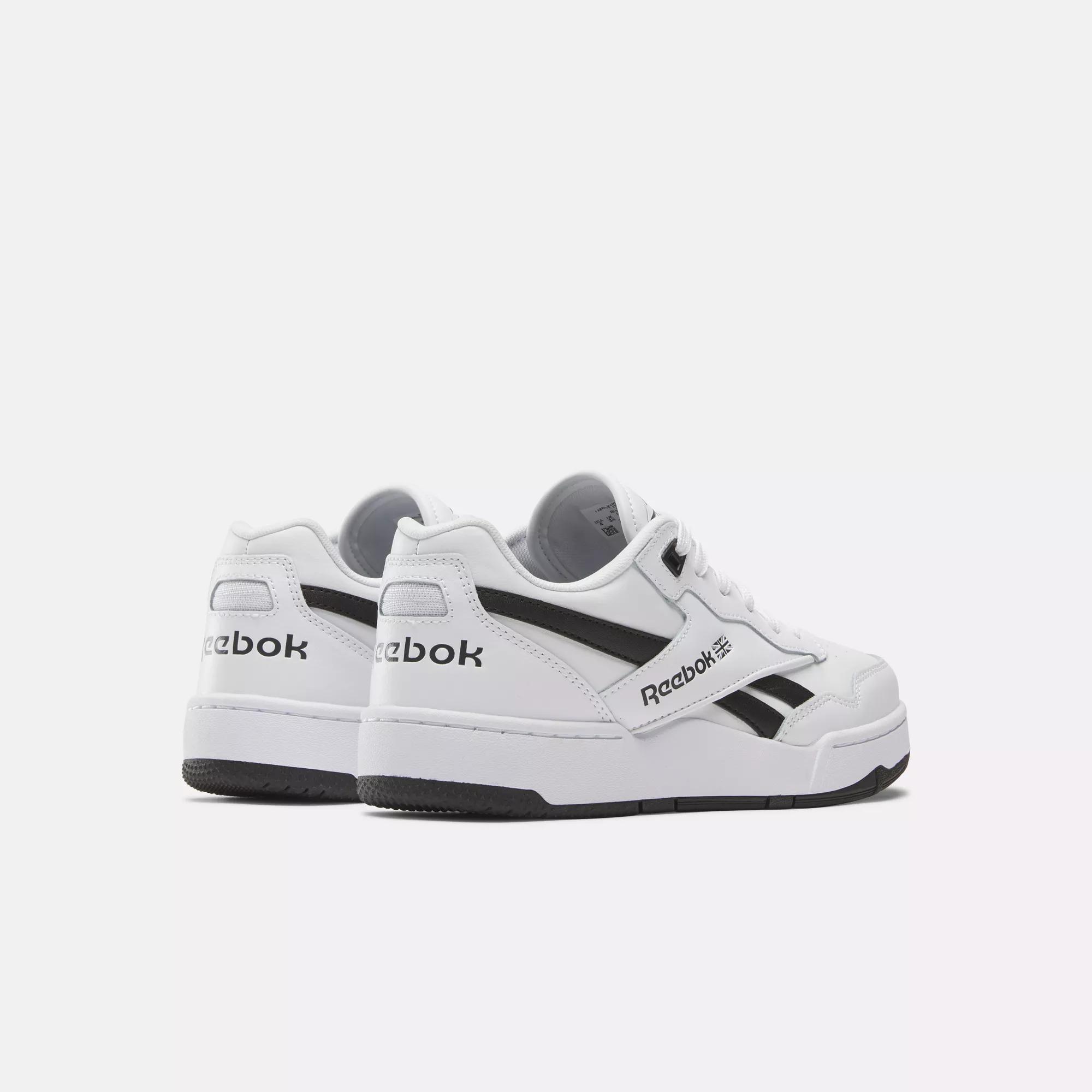 Reebok black and store white shoes