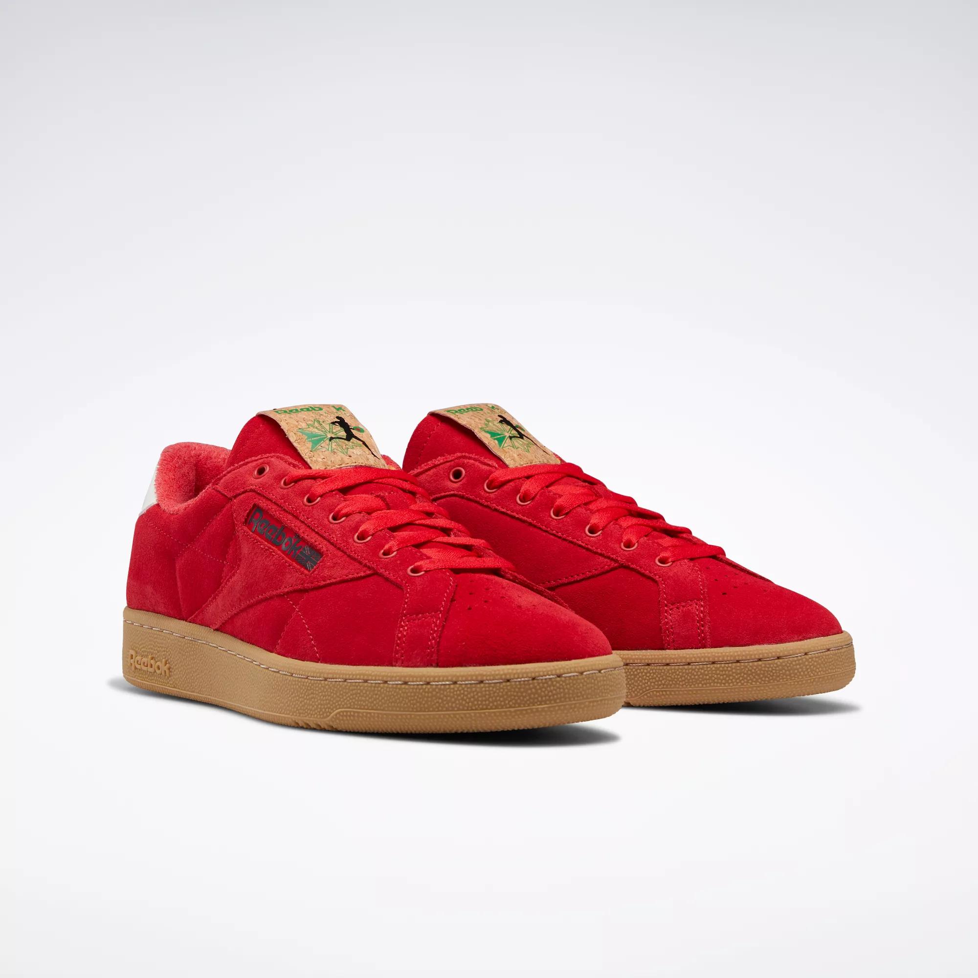 Reebok classic suede store uomo arancione