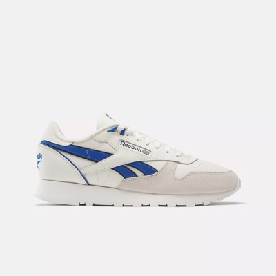 Reebok classic white store with blue