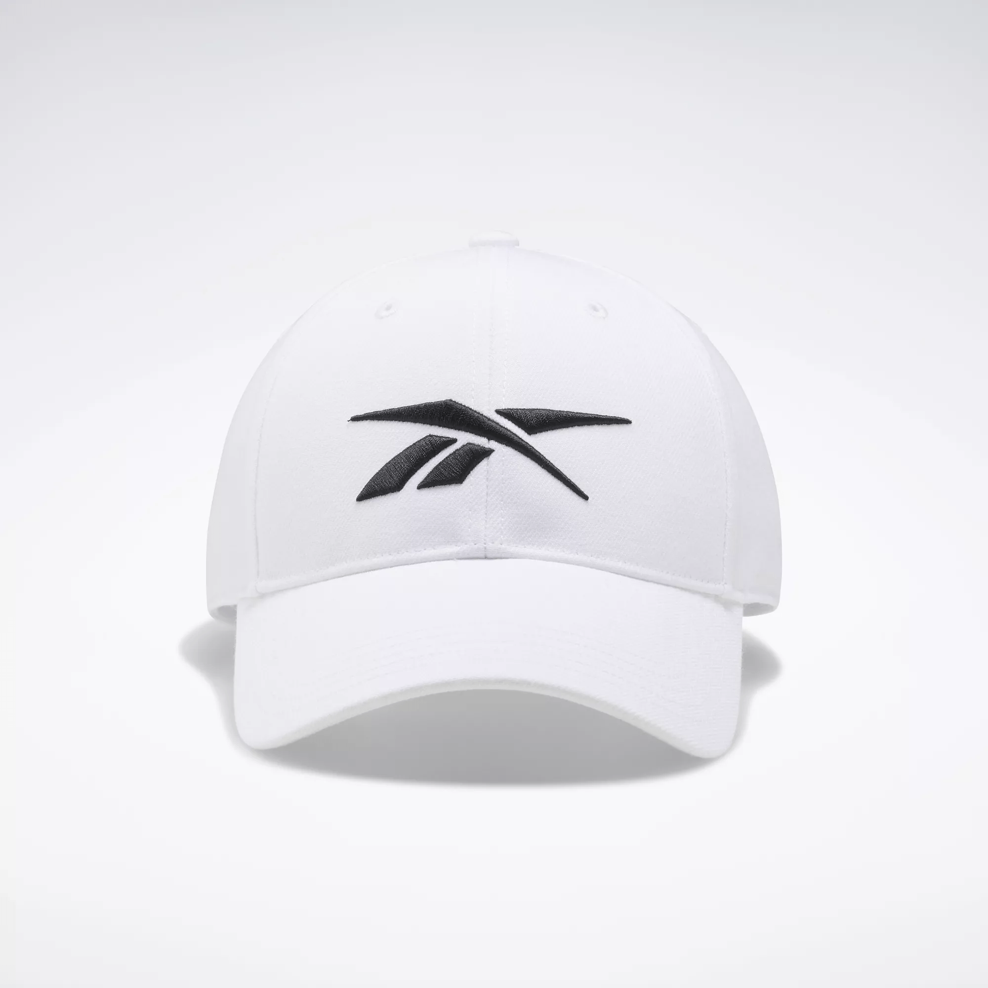 Shop Reebok Unisex Vector Baseball Cap In White