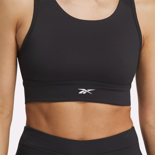 Reebok Training light support printed sports bra in black and white