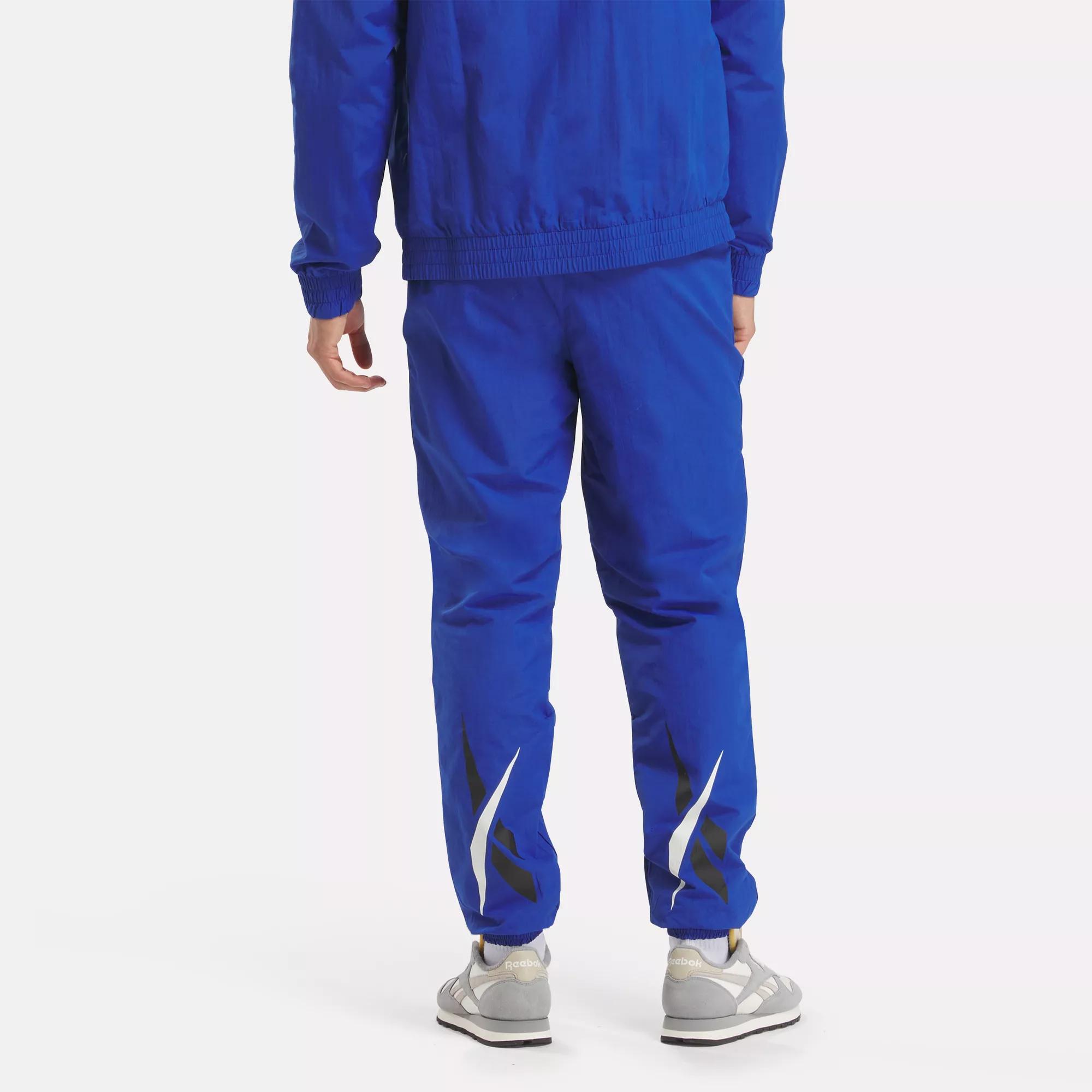 Reebok blue track pants online