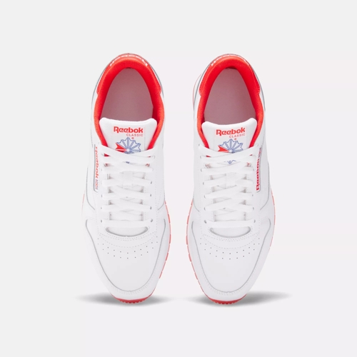 Red and white store reebok shoes