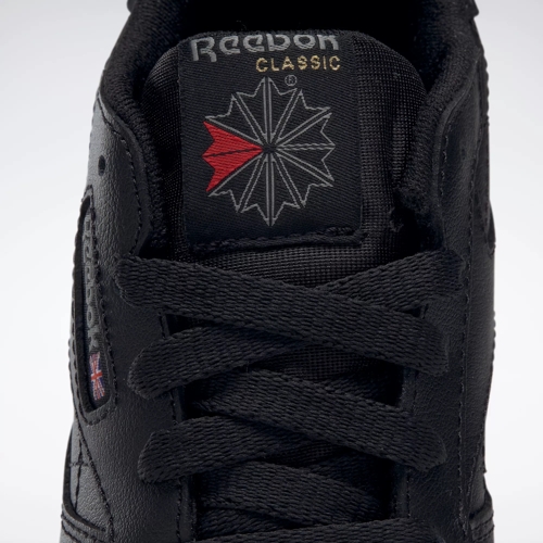 Boys black sales reebok trainers