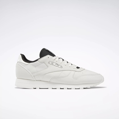 Reebok black cheap and white trainers