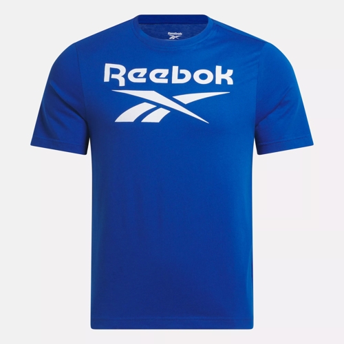 Reebok blue logo blue brickwall, Reebok logo, fashion brands