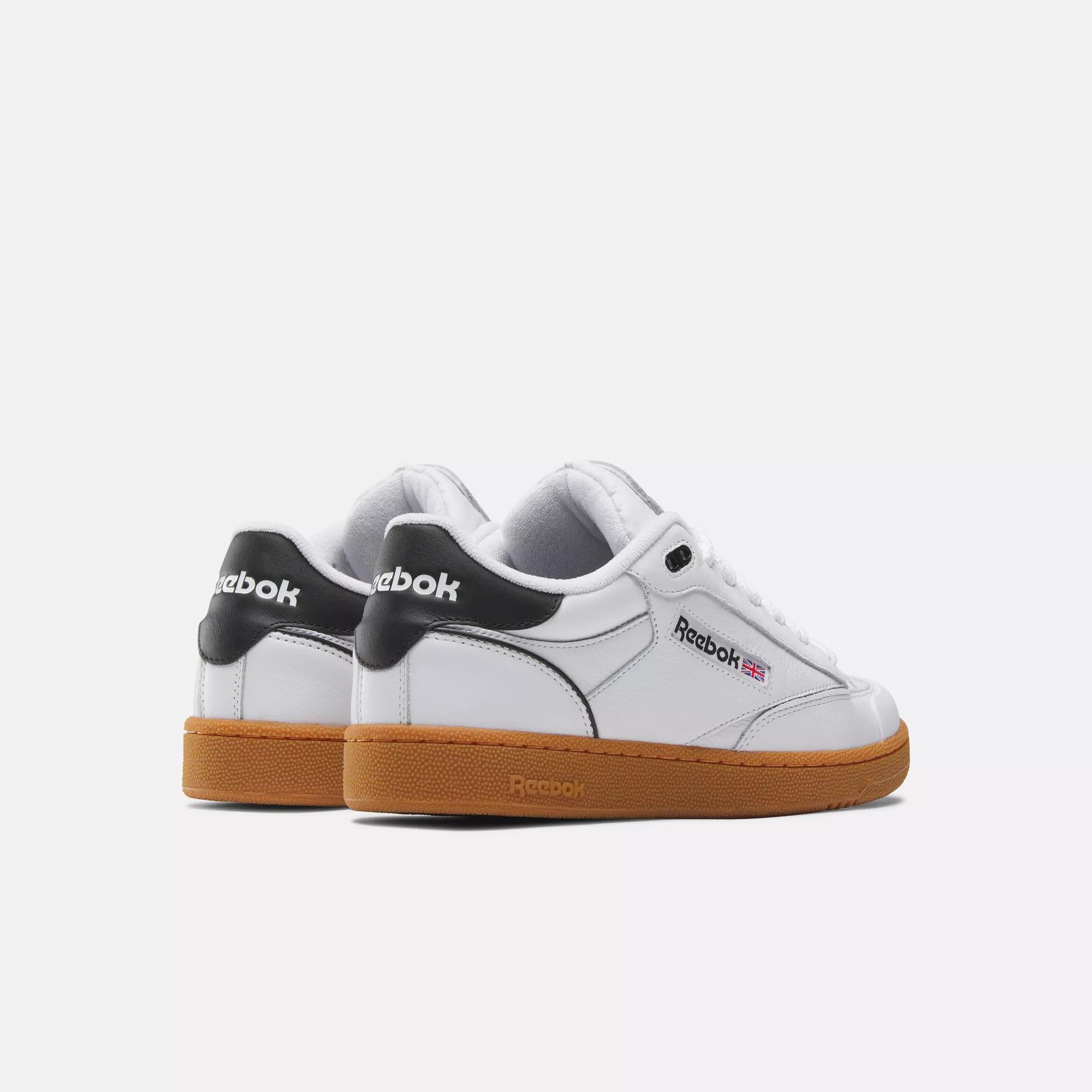 Reebok black best sale with gum sole