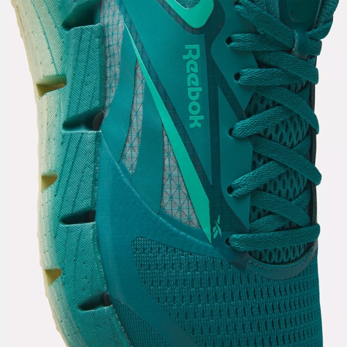 Reebok teal shoes top