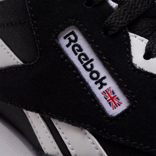 Black and white outlet reebok classics