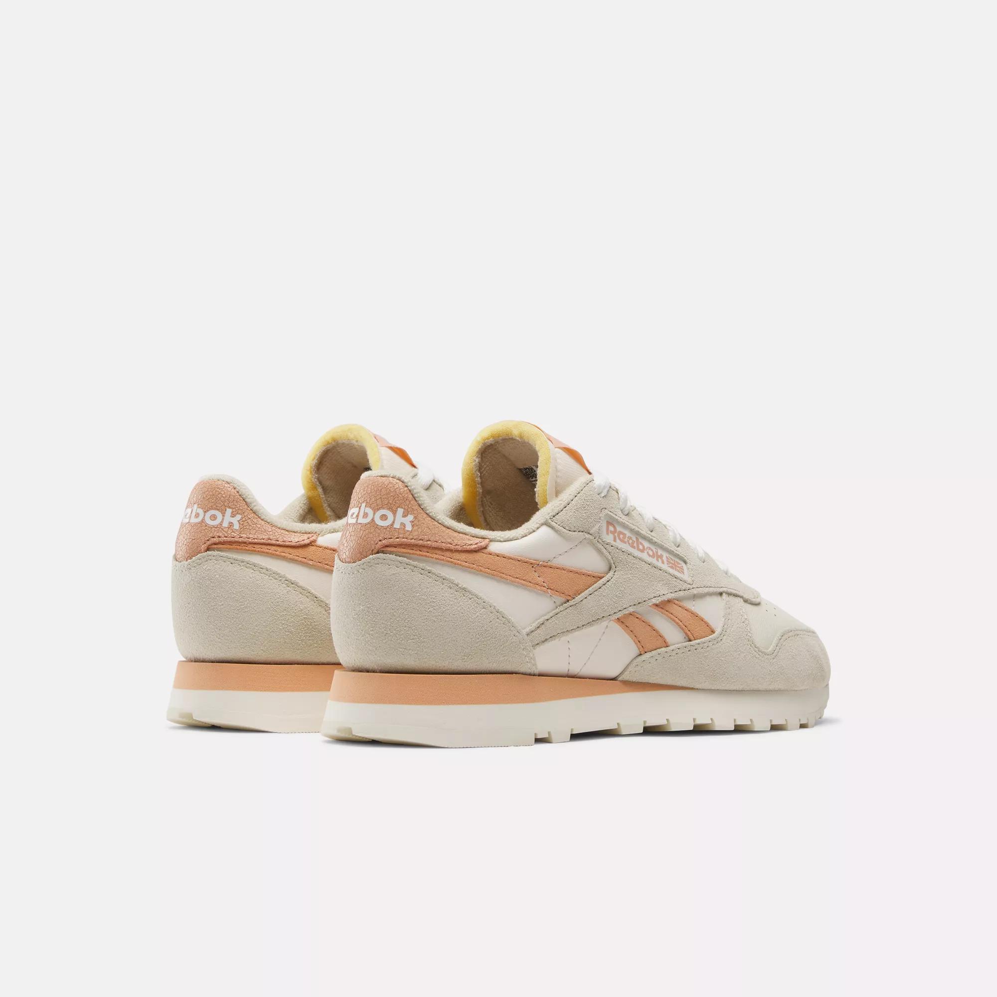 Beige fashion reebok trainers