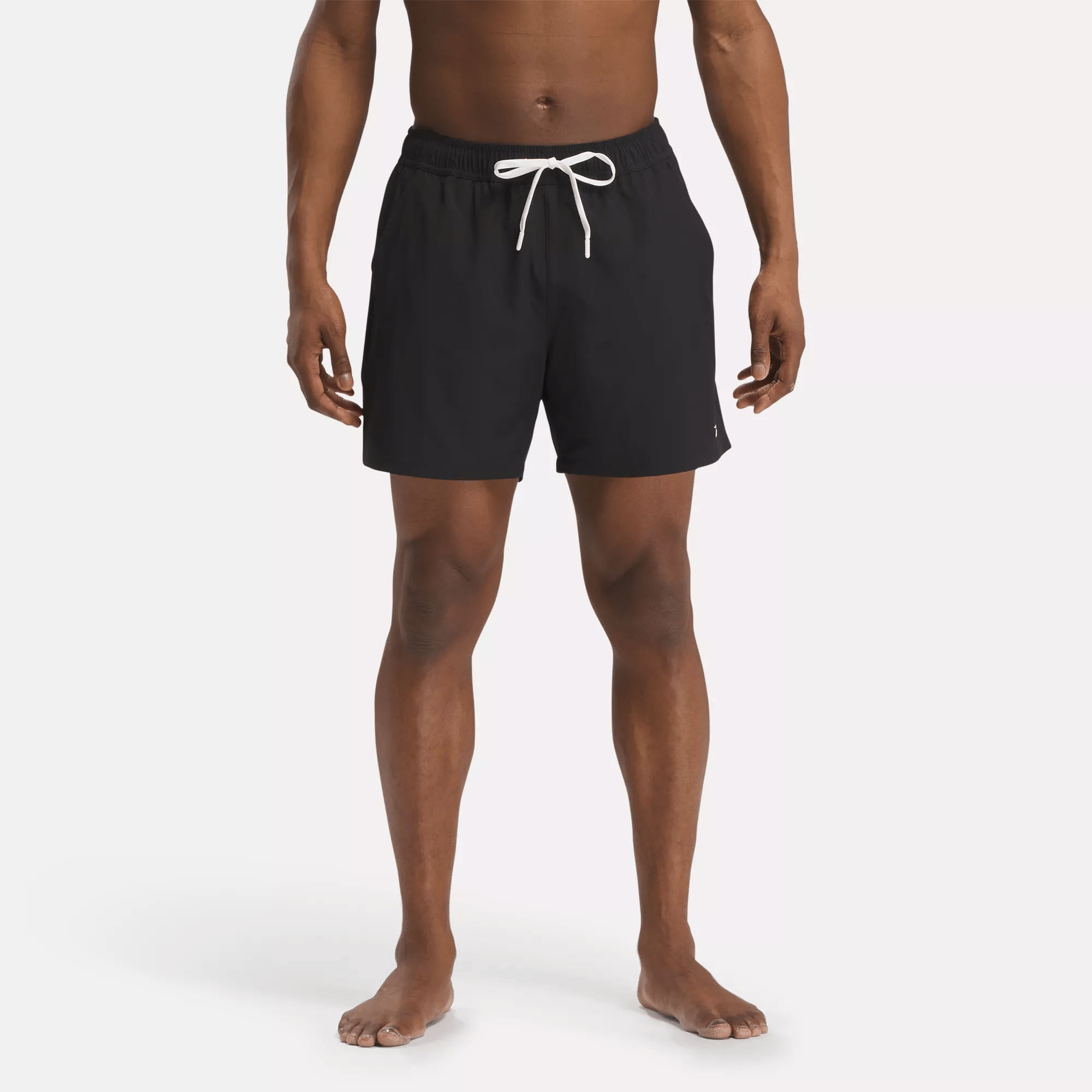 Shop Reebok Men's 5.5" Core Volley Swim Trunks In In Black